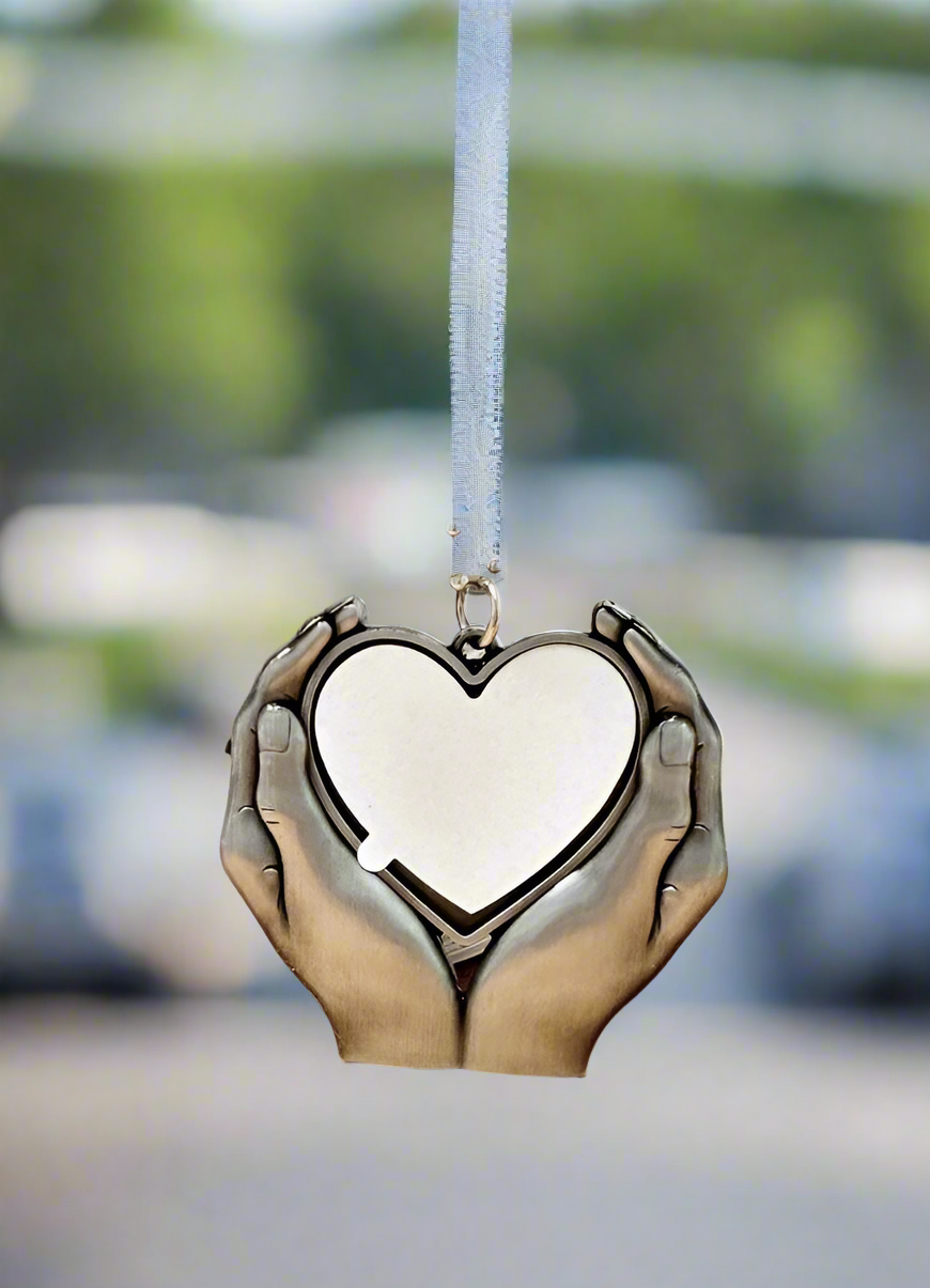 Memorial heart in hands